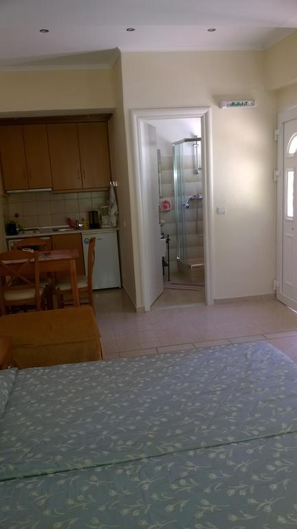 Bozikis Apartments & Studios Палеокастріца Номер фото